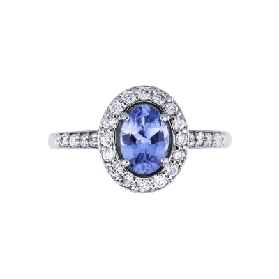 White gold 18k ring with an oval cut tanzanite and diamonds halo