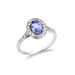 White gold 18k ring with an oval cut tanzanite and diamonds halo