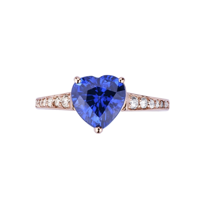 Rosé gold 18k ring with blue sapphire and diamond shoulder set 