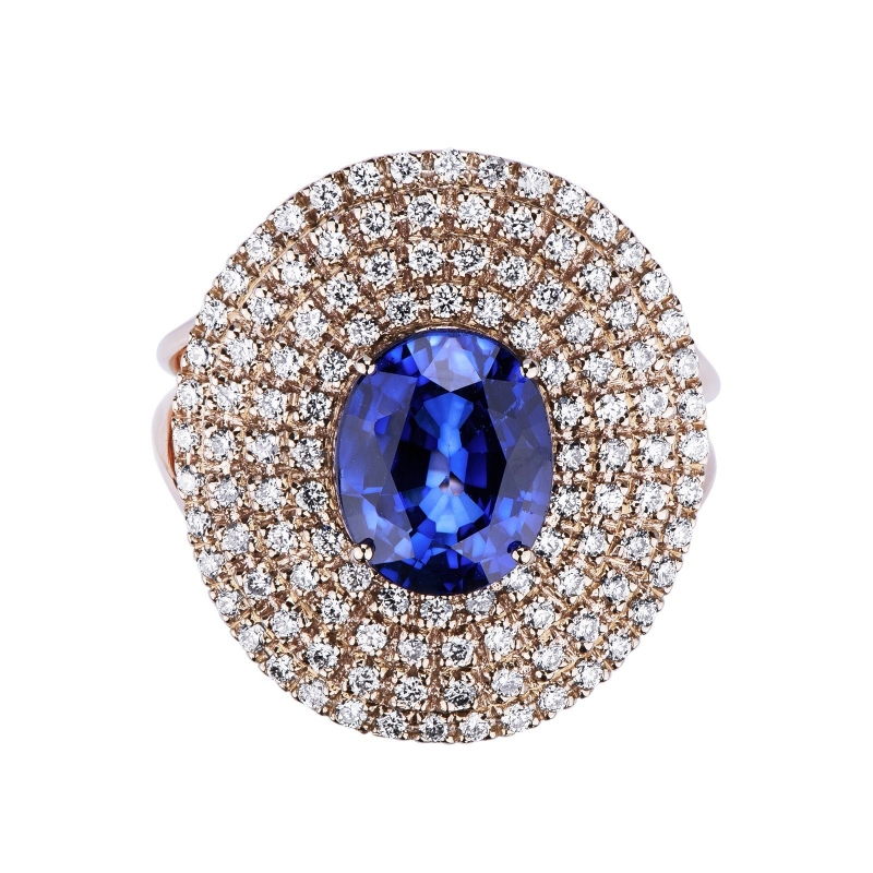 Rosé gold 18k halo ring with a blue sapphire and diamonds 