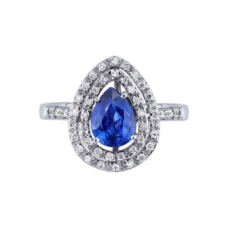 White gold 18k halo ring with pear cut blue sapphire and diamonds shoulder set