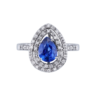 White gold 18k halo ring with pear cut blue sapphire and diamonds shoulder set
