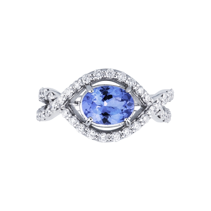 White gold 18k ring with an oval cut tanzanite of about 6x7mm and diamonds 