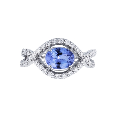 White gold 18k ring with an oval cut tanzanite of about 6x7mm and diamonds 