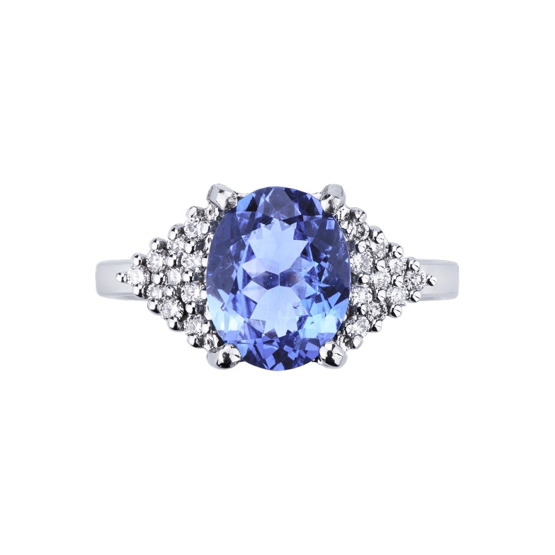 18k white gold ring with central oval tanzanite and lateral diamond paves