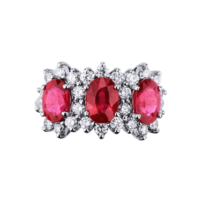 18k white gold halo ring with three rubies oval cut and diamonds 