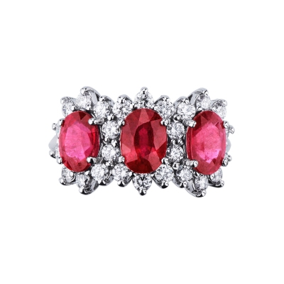 18k white gold halo ring with three rubies oval cut and diamonds 