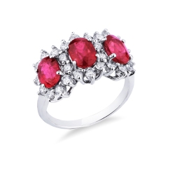 18k white gold halo ring with three rubies oval cut and diamonds 