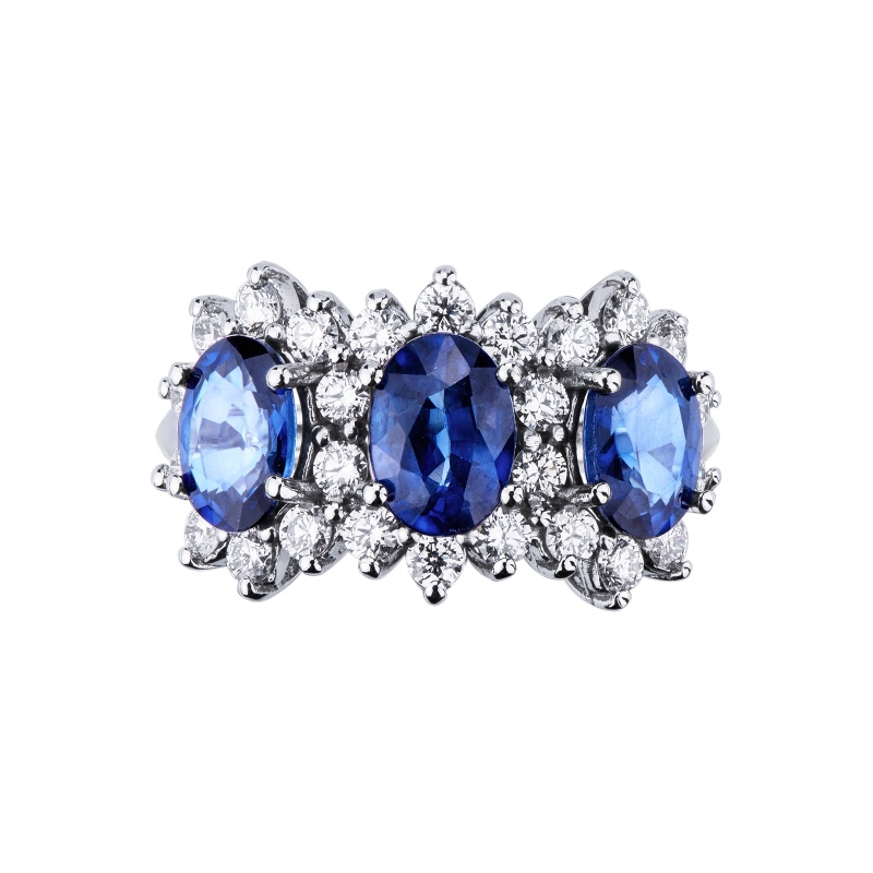 18k white gold halo ring with 3 Oval sapphires crowned by diamonds