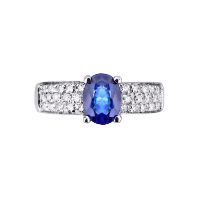 Band ring in white gold 18k with a central blue sapphire and diamonds 