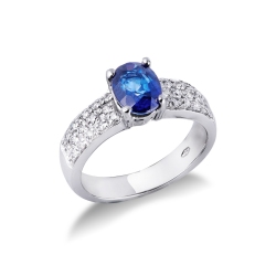 Band ring in white gold 18k with a central blue sapphire and diamonds 