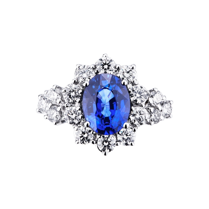 Halo ring with a blue sapphire and diamonds white gold 18k 