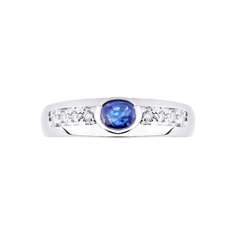 18k white gold ring with central blue sapphire and side diamonds 