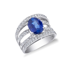 White gold 18k ring with diamonds and a central blue sapphire oval cut 