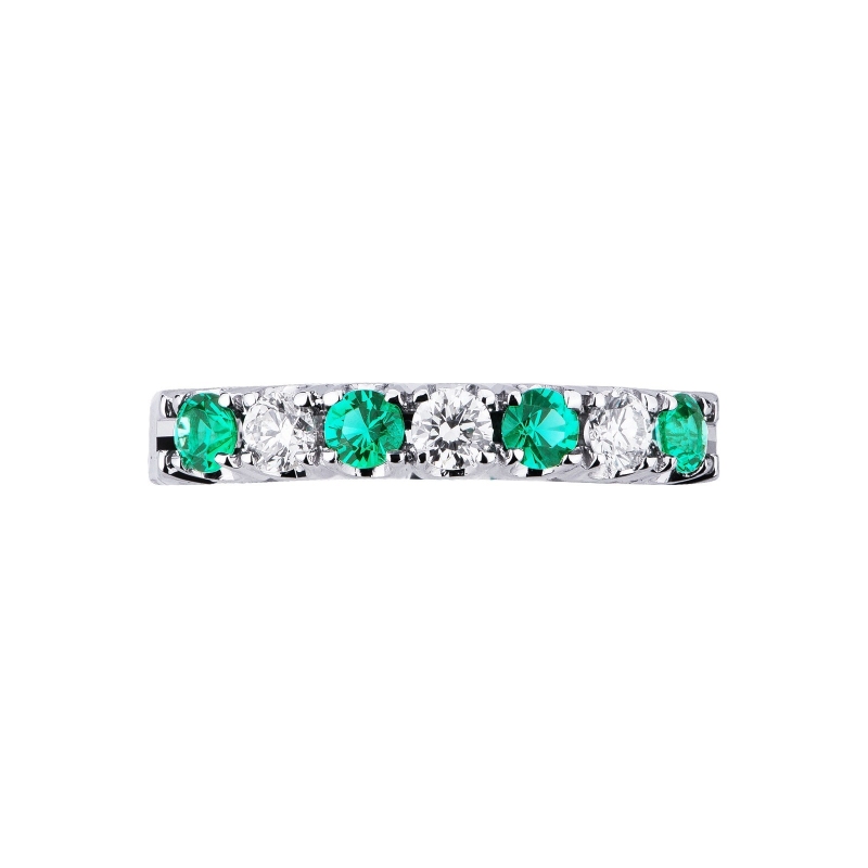 White gold 18k half eternity ring with three diamonds and four emeralds