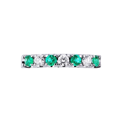 White gold 18k half eternity ring with three diamonds and four emeralds