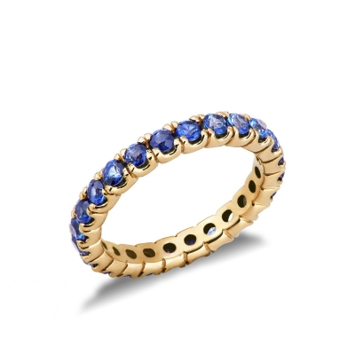 Eternity ring with blue sapphires in yellow gold 18k