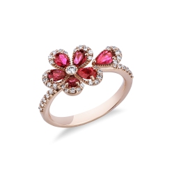 Anello fiore in oro rosa 18k con rubini e goccia e diamanti