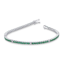 Wire style tennis bracelet with emeralds and diamonds