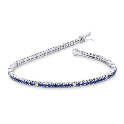 Wire style tennis bracelet with blue sapphires and diamonds
