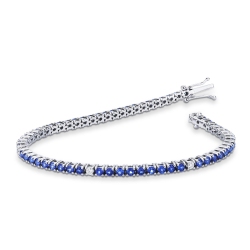 Wire style tennis bracelet with alternated sapphires and round cut diamonds