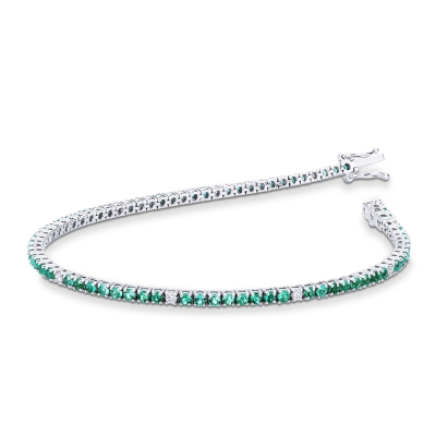 Wire links tennis bracelet with emeralds and diamonds