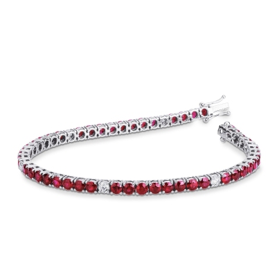 Wire style tennis bracelet with rubies and round cut diamonds