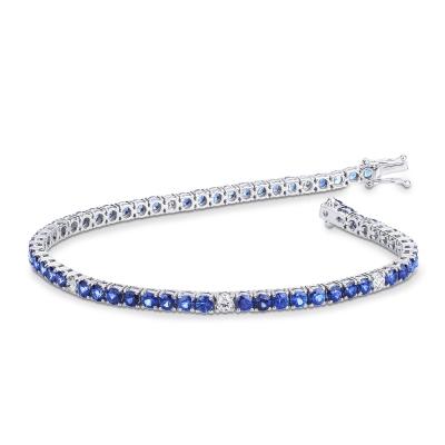 Wire style tennis bracelet with sapphires and round cut diamonds