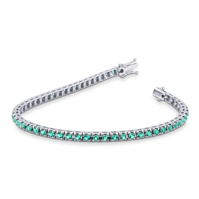 Pyramid links tennis bracelet with emeralds