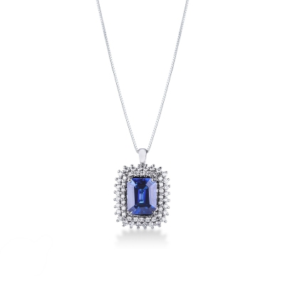Necklace with pendant, central emerald cut blue sapphire and round cut diamonds