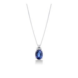 18k white gold necklace with diamonds and oval cut sapphire pendant
