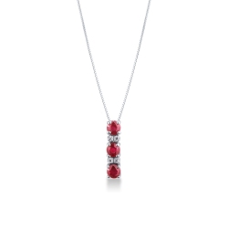 18k white gold necklace with ruby and diamond trilogy necklace