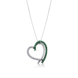 Heart shape pendant with diamonds and a row of emeralds