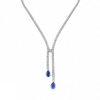 Diamond tennis necklace with 2 pear cut blue sapphires