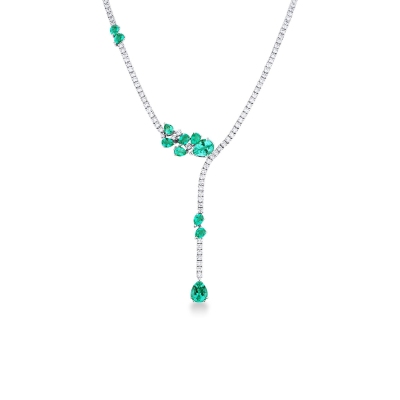 Fancy tennis necklace with emeralds and diamonds