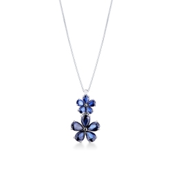 Collana in oro bianco 18k con due fiori in zaffiri blu