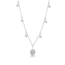 Necklace with 6 round cut diamonds and a four leaf clover pendant 