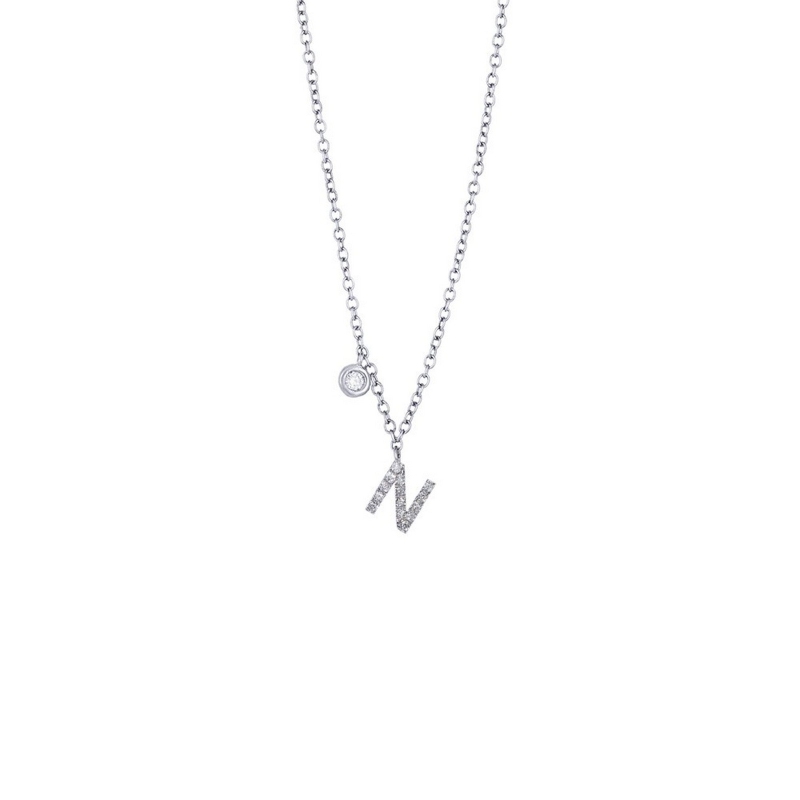 Letter N pendant with diamonds and a little solitaire  