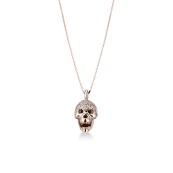 18k rose gold skull with black and white diamonds