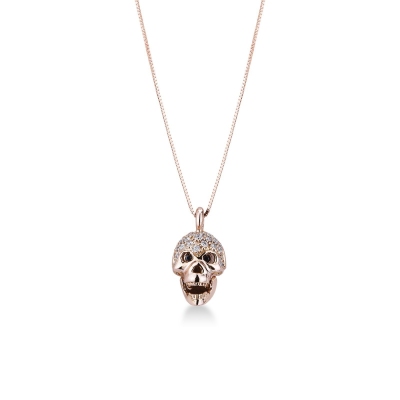 18k rose gold skull with black and white diamonds