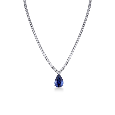 Gradueted tennis chain in 18k white gold with a big  pear cut blue sapphire and diamonds