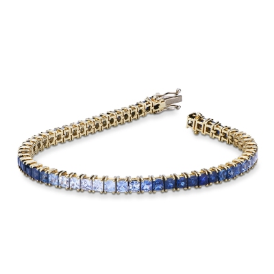 Fancy 18k yellow gold tennis bracelet with sapphire's blue shades
