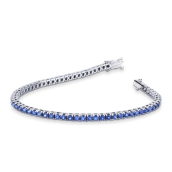 Wire style tennis bracelet with blue sapphires