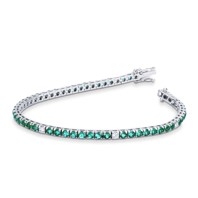 Wire tennis bracelet with emeralds and diamonds