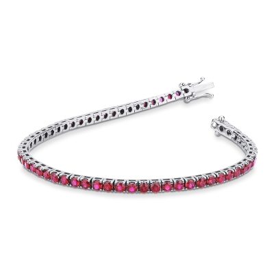 Ruby tennis bracelet in 18k white gold