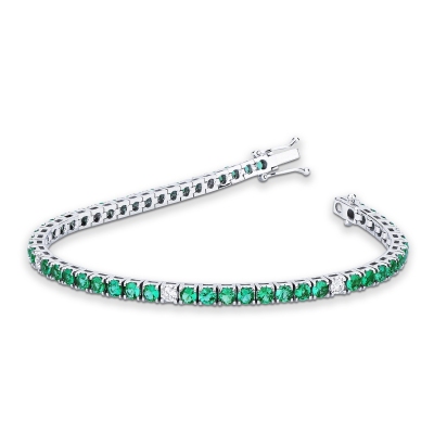 Tennis bracelet with emeralds and diamonds