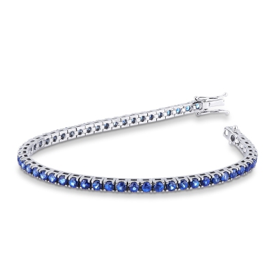 18k white gold tennis bracelet with blue sapphires