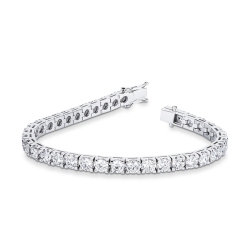 Bracciale tennis lineare a griffe in oro bianco 18k diamanti