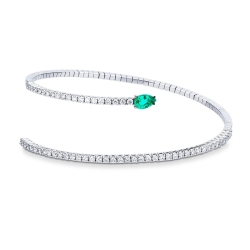 Spiral bracelet with diamonds and a drop cut emerals