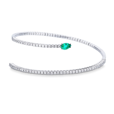 Spiral bracelet with diamonds and a drop cut emerals